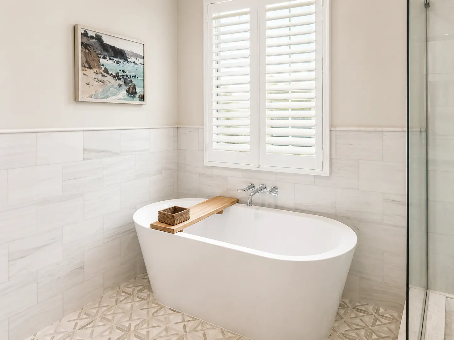 White poly shutters above a freestanding tub in a Laguna Niguel master bath