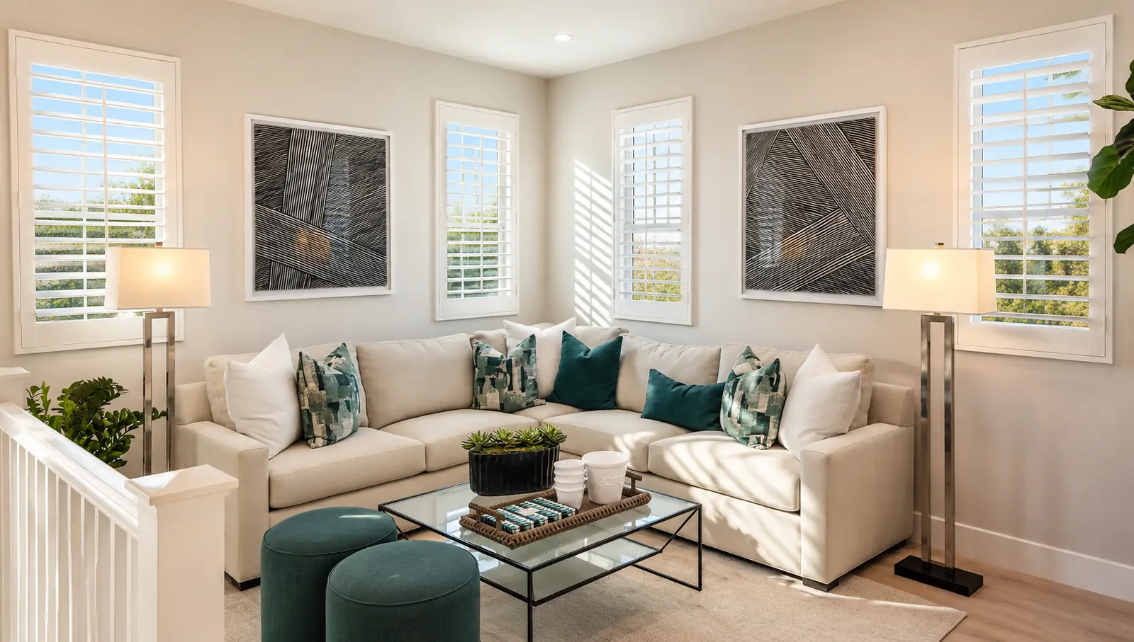 White plantation shutters on four narrow windows in a transitional loft