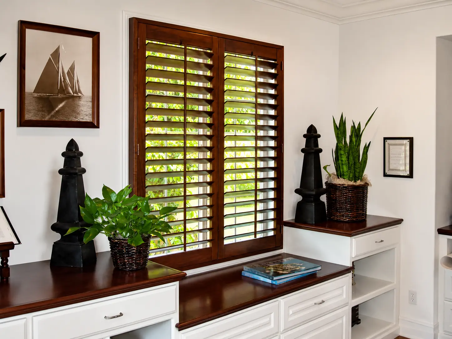 Mahogany-stained plantation shutters in a coastal-traditional study